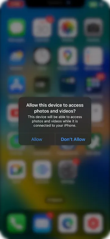 Запрос на доступ к фото на iPhone
